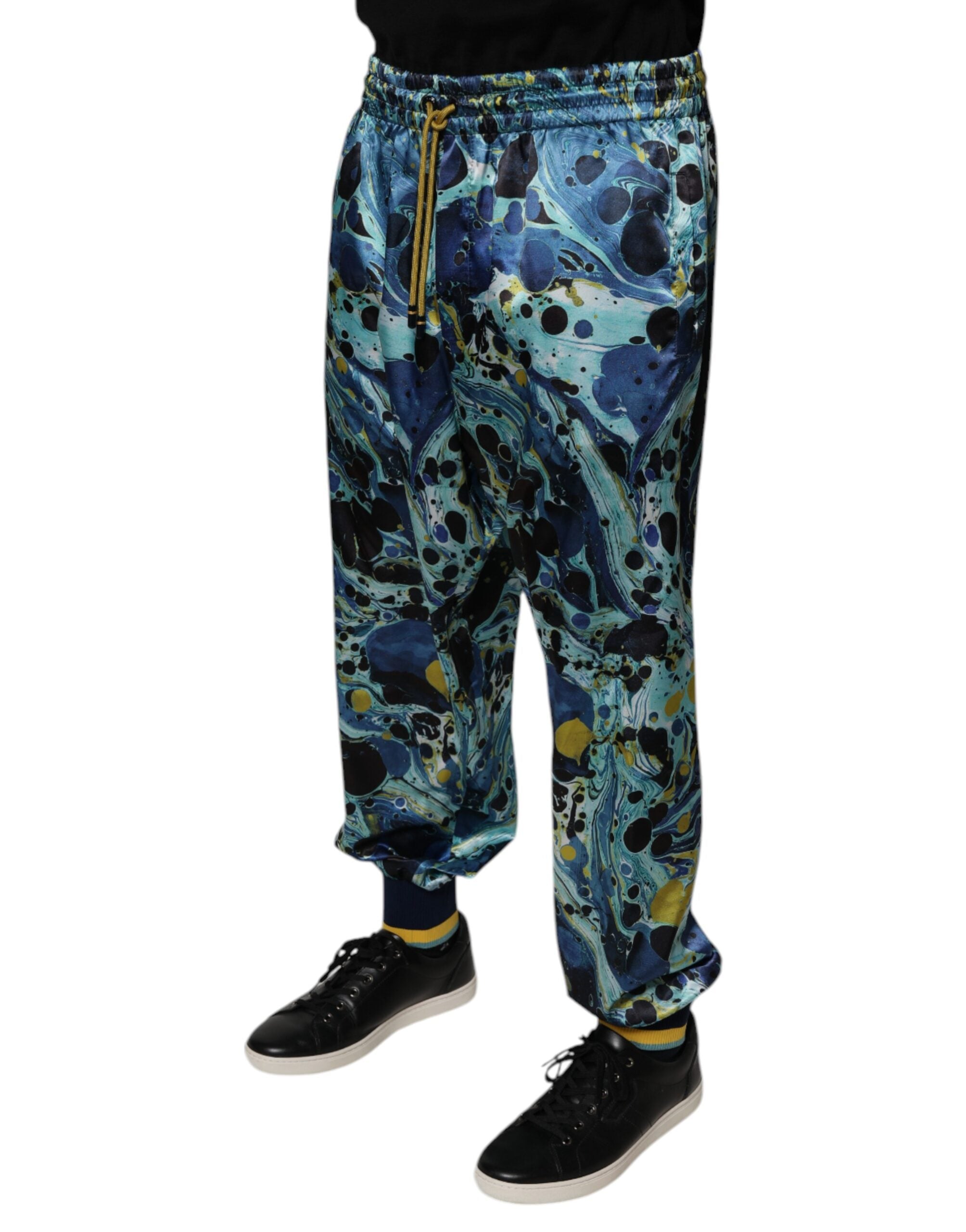 Pantalon de jogging Dolce & Gabbana pour homme, multicolore avec imprimé marbre, confortable et tendance.