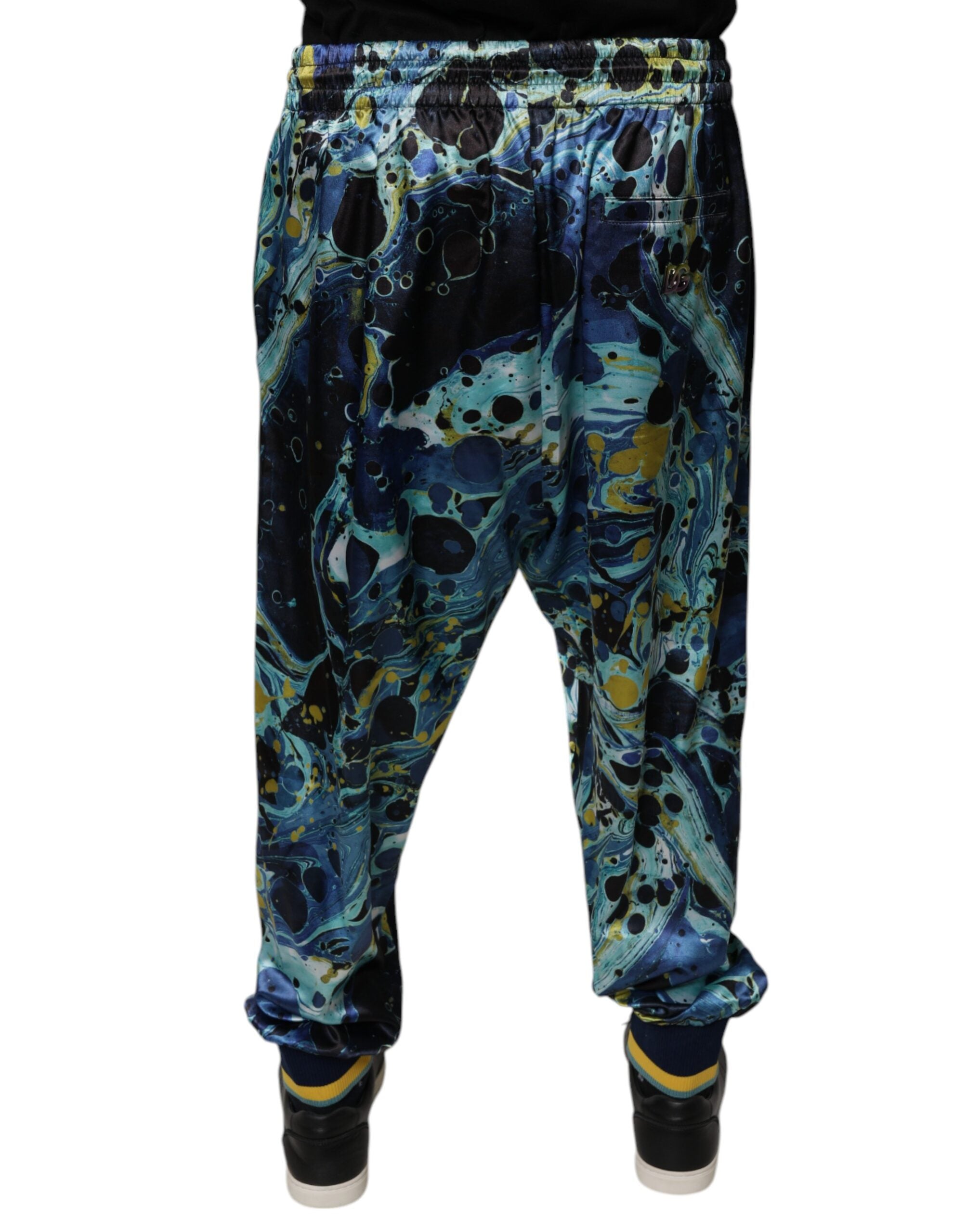 Pantalon de jogging pour homme Dolce & Gabbana à motif marbre multicolore, style décontracté et tendance.