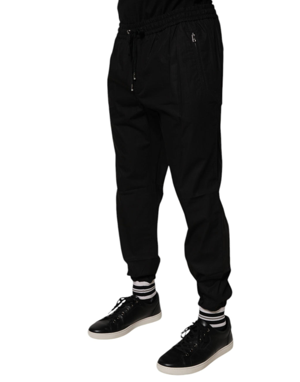Pantalon jogger pour homme Dolce & Gabbana en coton noir, style décontracté avec ceinture élastique et poches latérales.