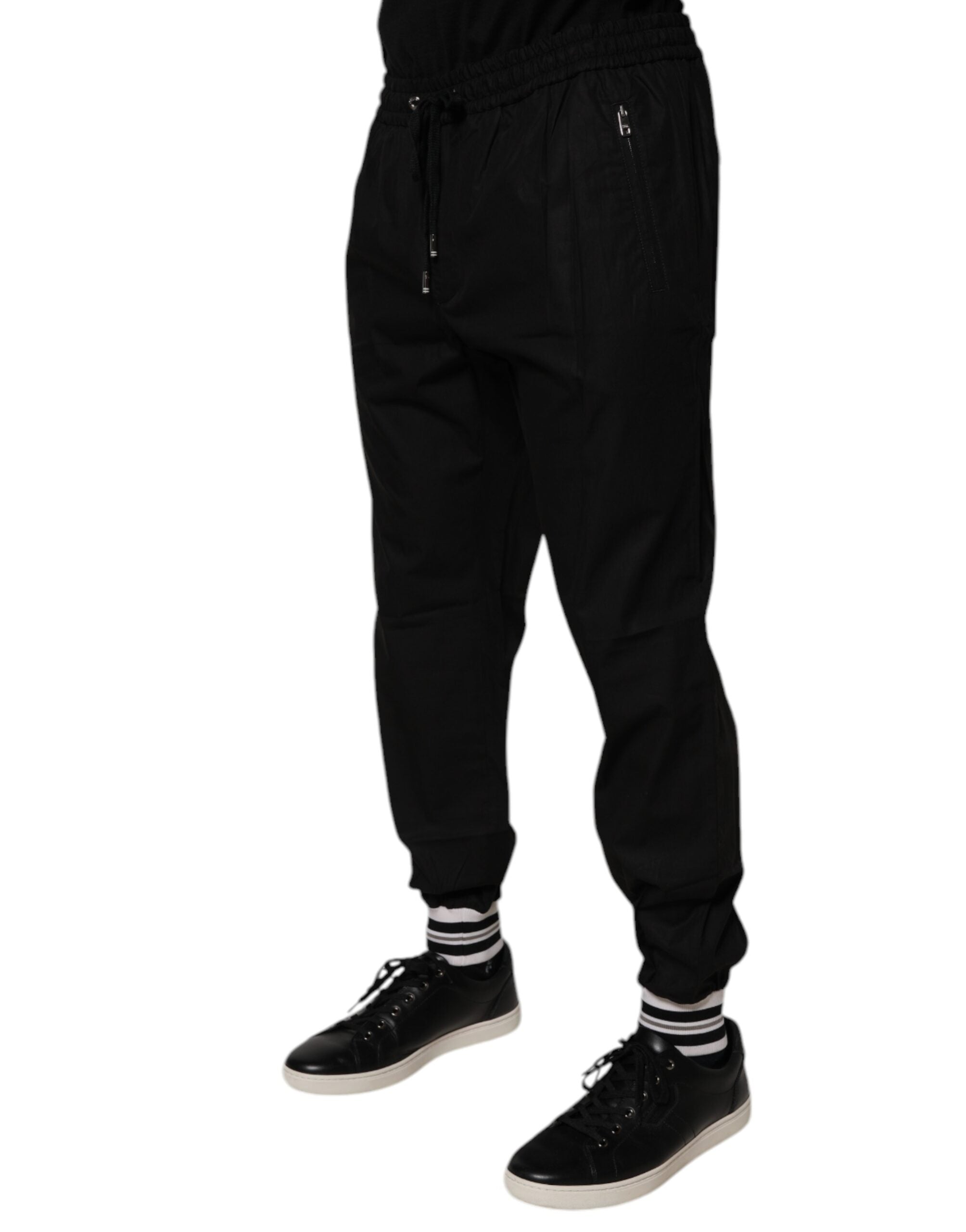Pantalon jogger pour homme Dolce & Gabbana en coton noir, style décontracté avec ceinture élastique et poches latérales.
