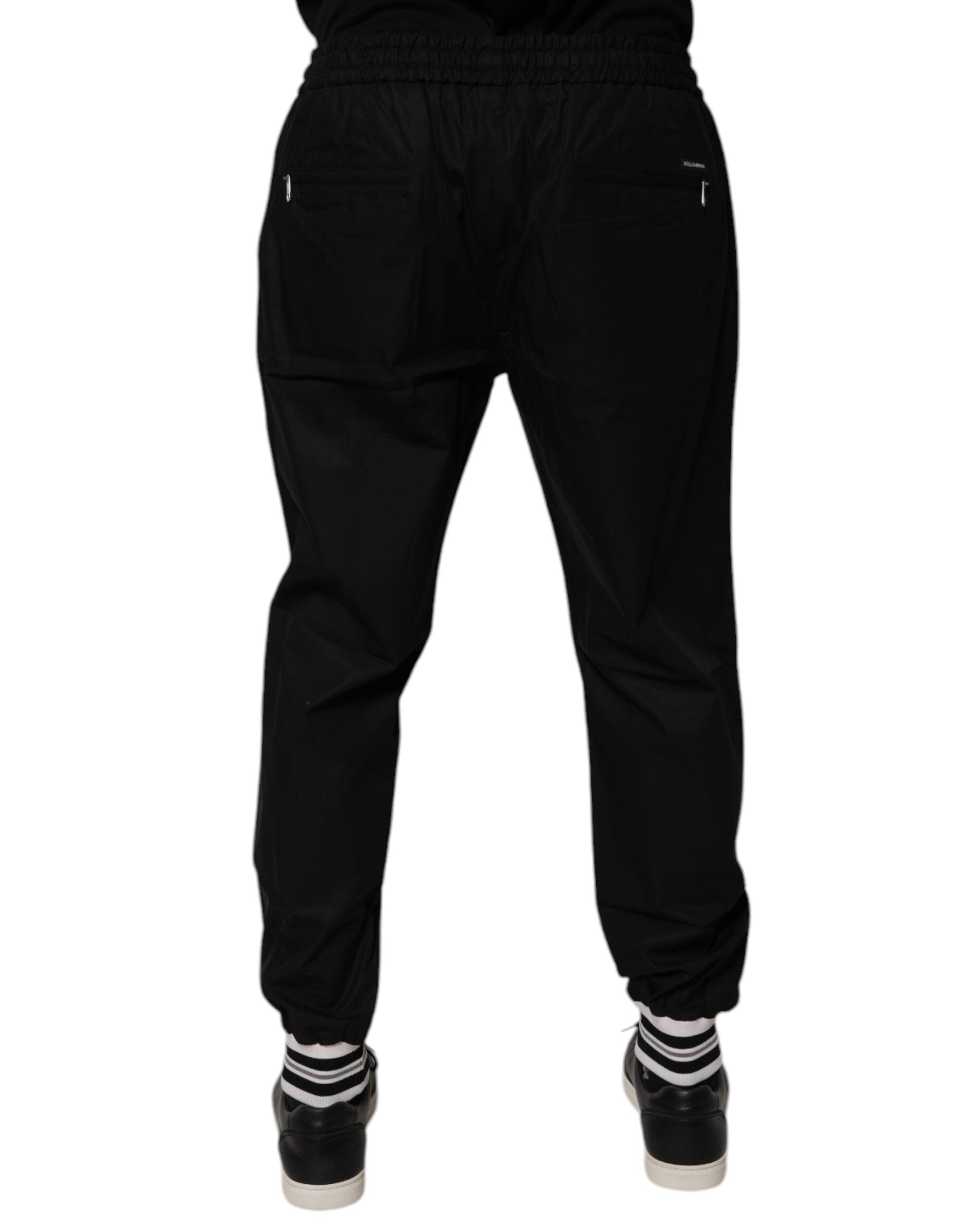 Pantalon de jogging homme Dolce & Gabbana en coton noir, style décontracté et confortable, avec logo discret.
