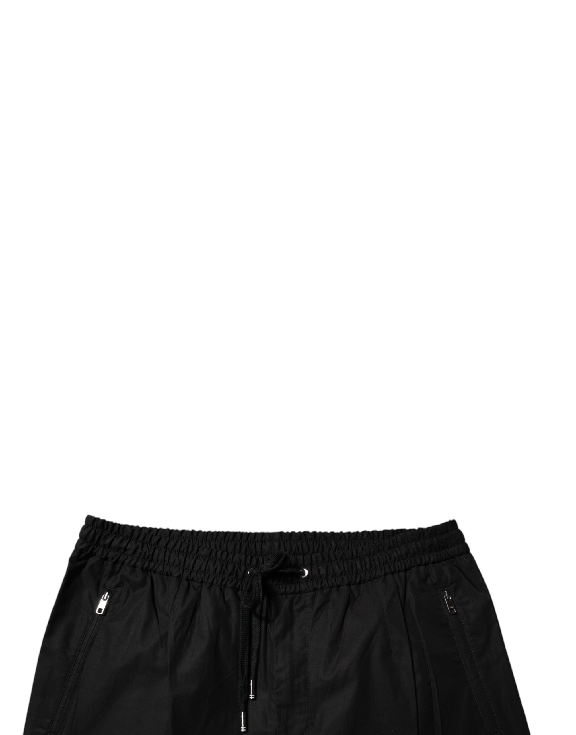 Pantalon jogger homme Dolce & Gabbana en coton noir, style décontracté avec cordon de serrage et poches latérales.