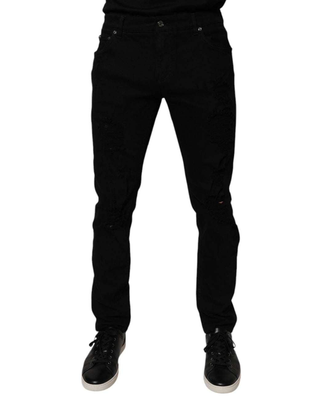 Jean skinny en coton déchiré noir de Dolce & Gabbana pour homme, denim tendance avec détails usés.
