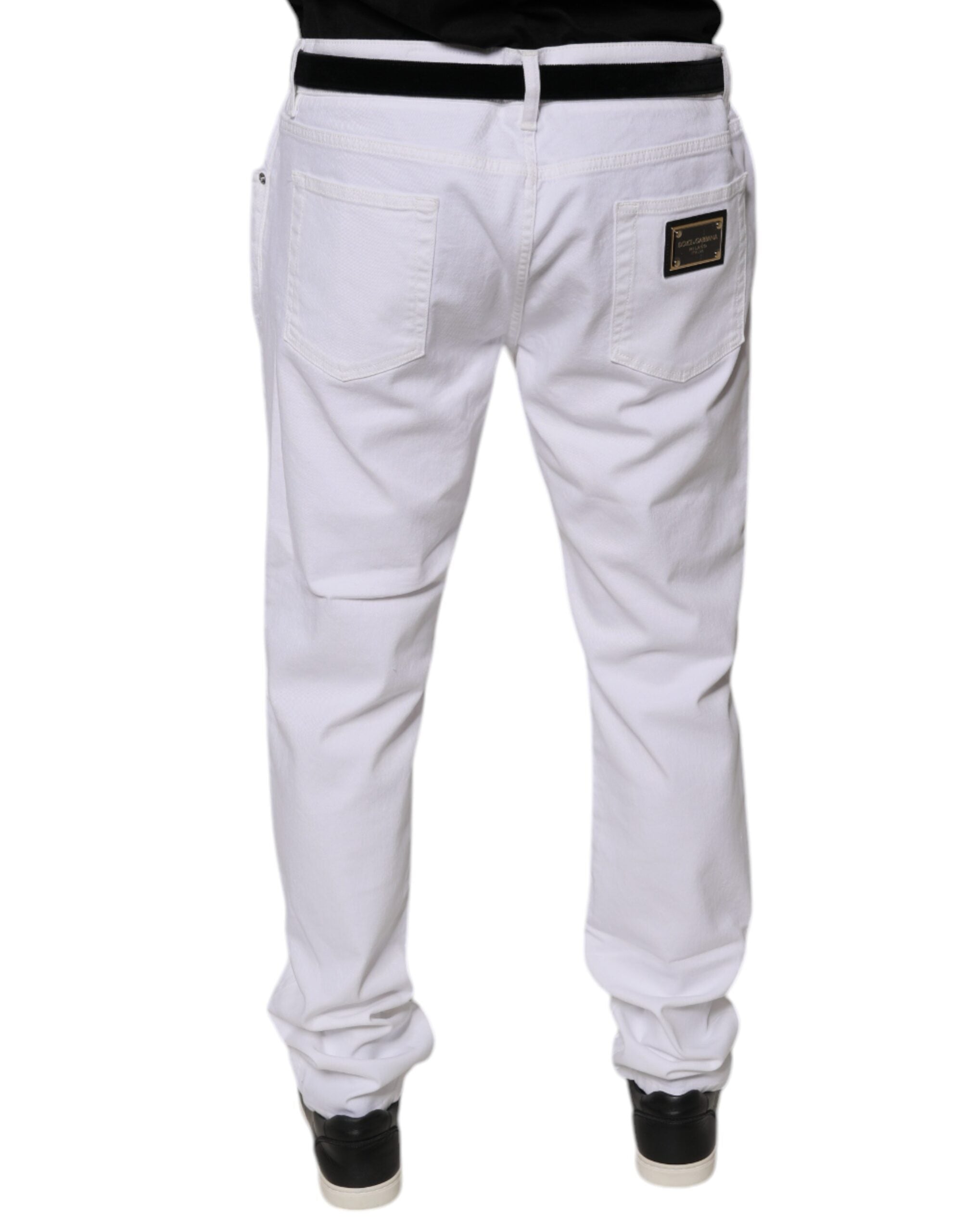 Jeans homme Dolce & Gabbana en coton blanc, coupe skinny, avec stretch, aspect denim, visible sur l'image.