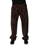 Jeans homme Dolce & Gabbana en coton noir avec motif cerise, coupe droite, style décontracté et moderne.