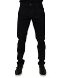 Jeans slim en coton extensible noir de Dolce & Gabbana pour homme, coupe ajustée et détails classiques.