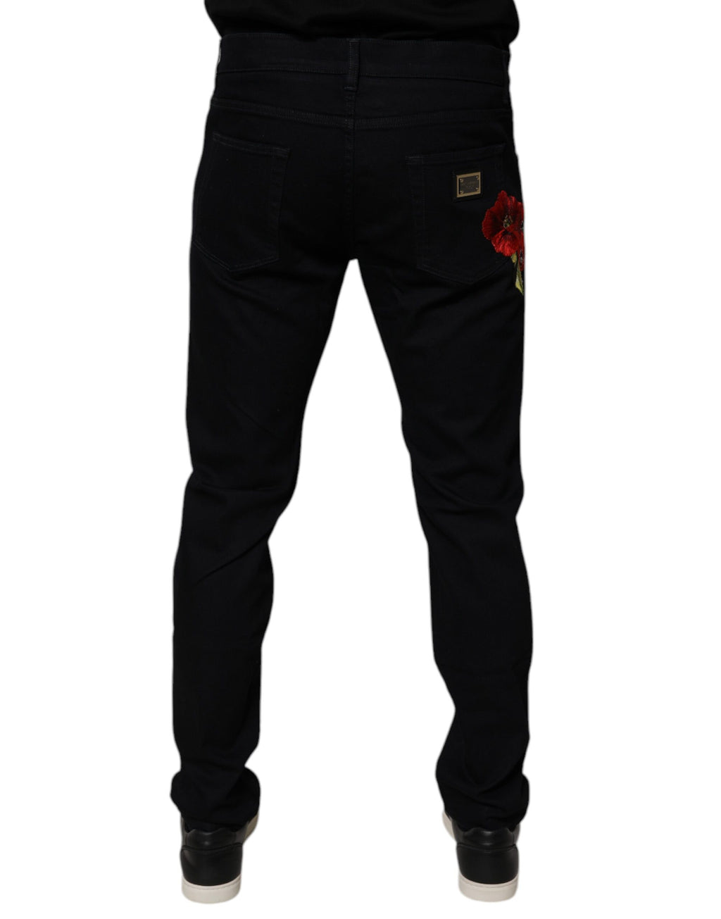 Jeans slim en denim noir pour homme de Dolce & Gabbana, en coton stretch, vue de face.
