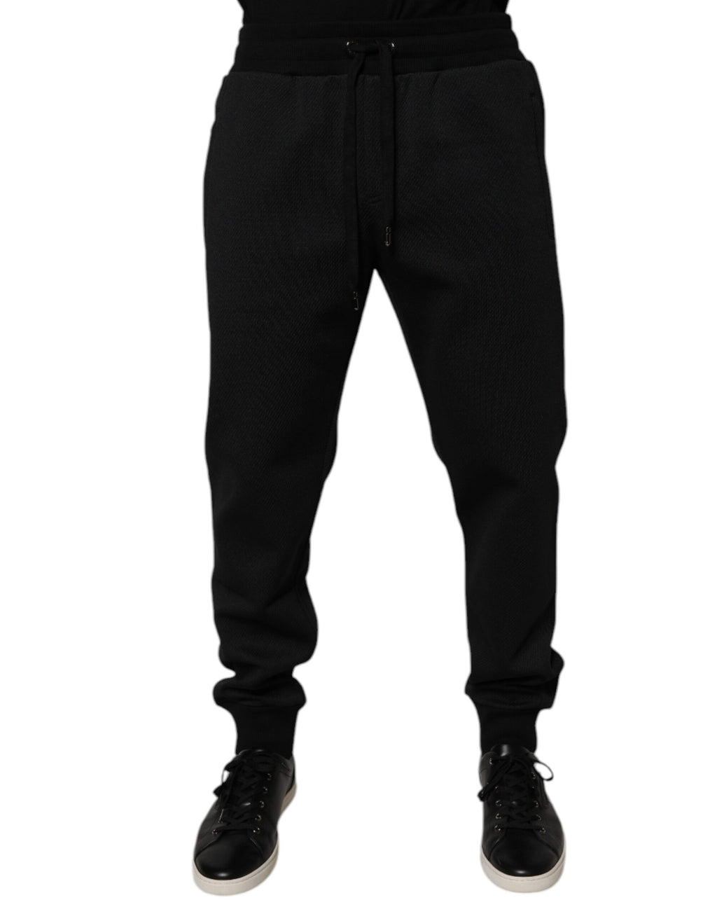 Pantalons joggers pour homme Dolce & Gabbana en polyester noir, confortables avec détails modernes.