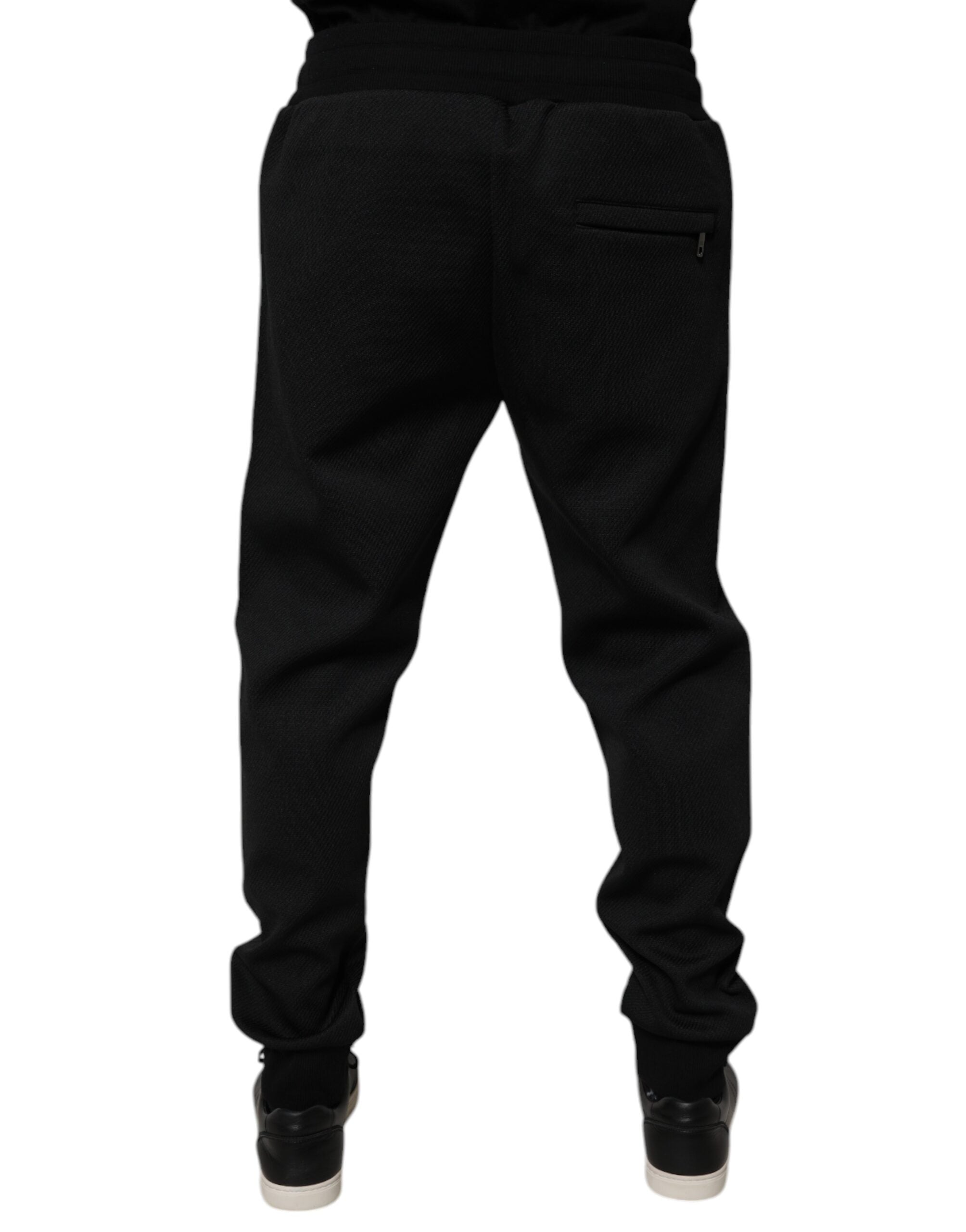 Pantalon jogger pour homme Dolce & Gabbana en polyester noir, style décontracté avec poches et taille elastiquée.