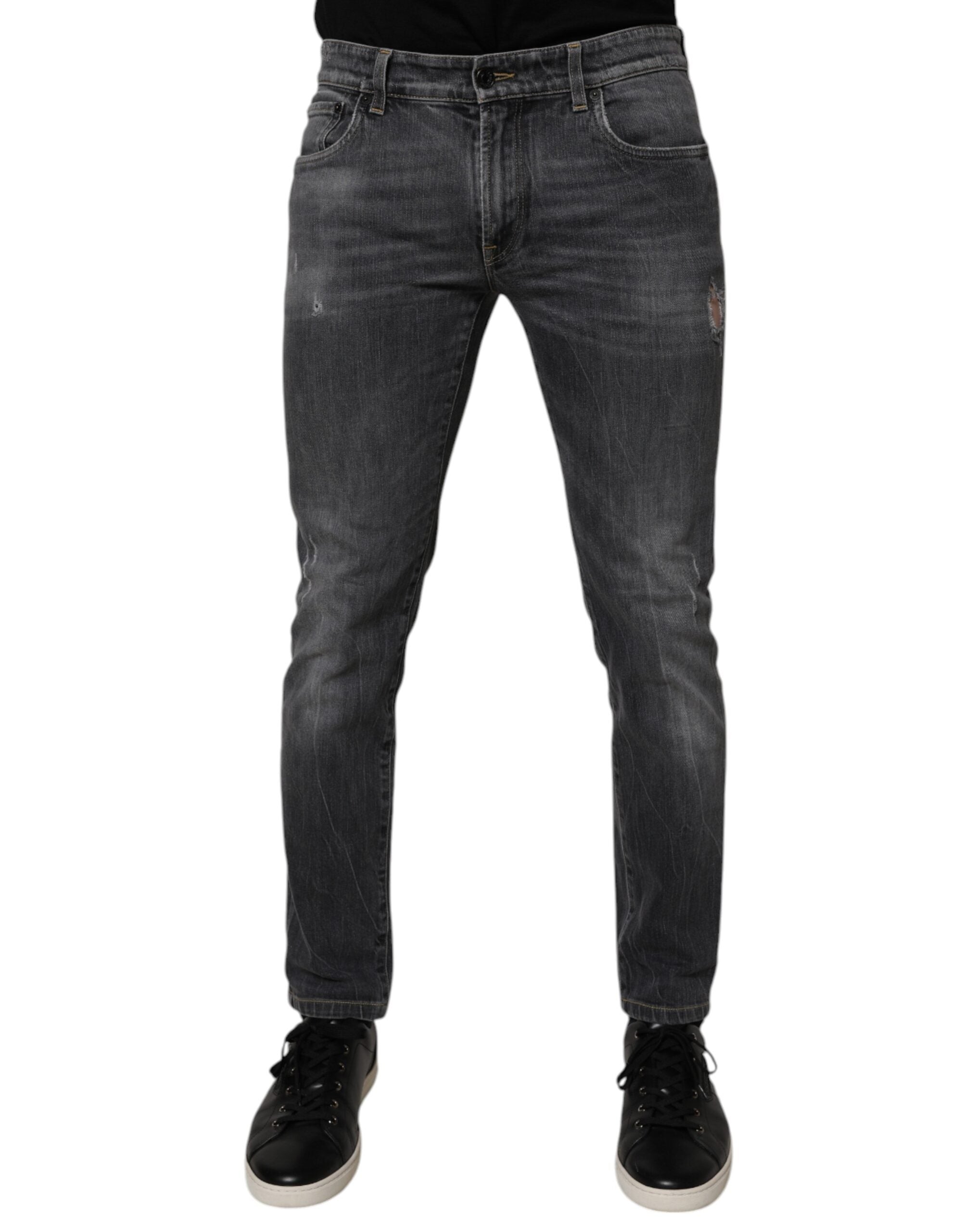 Jean homme skinny en denim gris foncé délavé de Dolce & Gabbana, coupe ajustée et style moderne.
