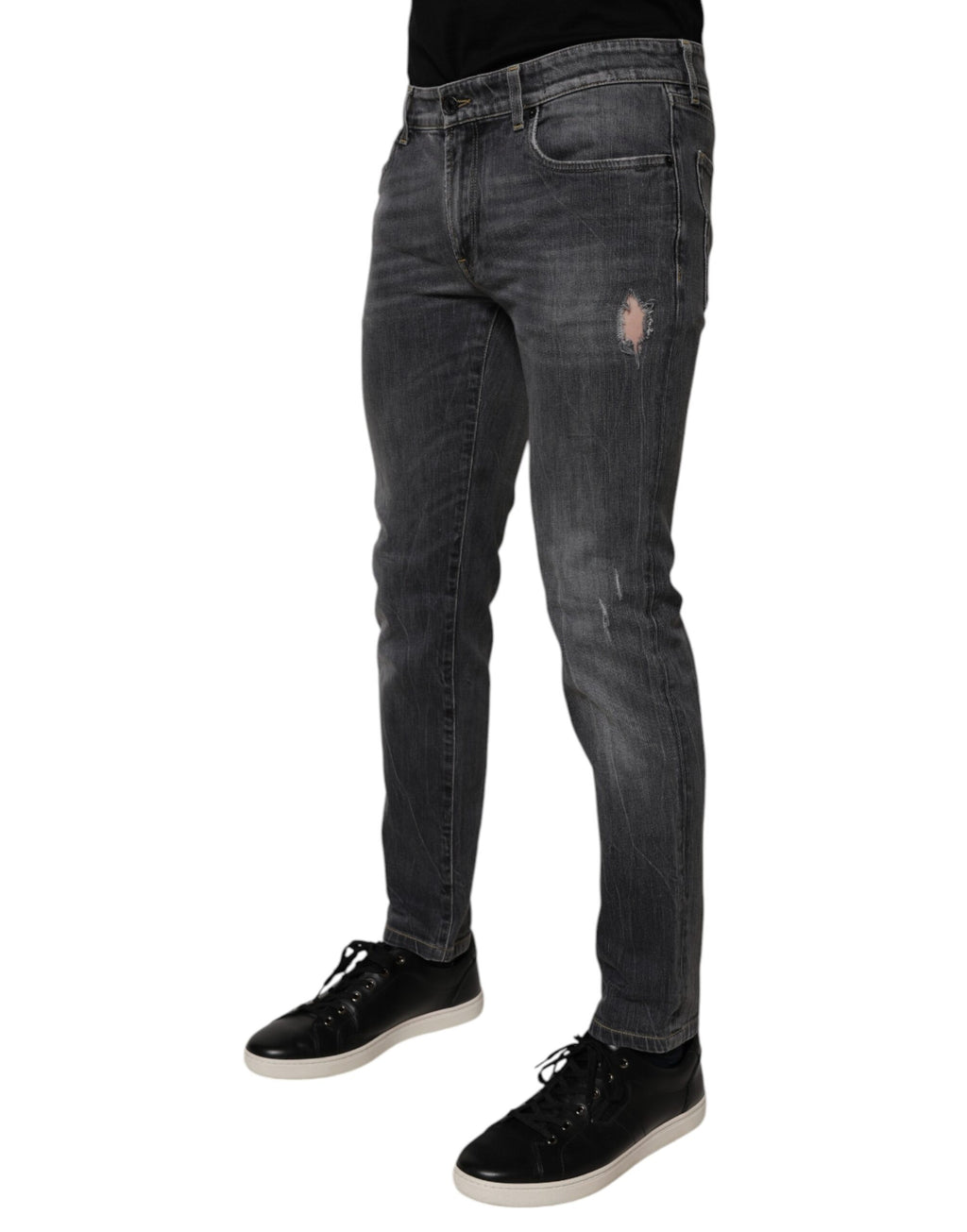 Jeans homme Dolce & Gabbana en denim gris foncé, coupe skinny, en coton lavé, avec détails modernes et élégants.