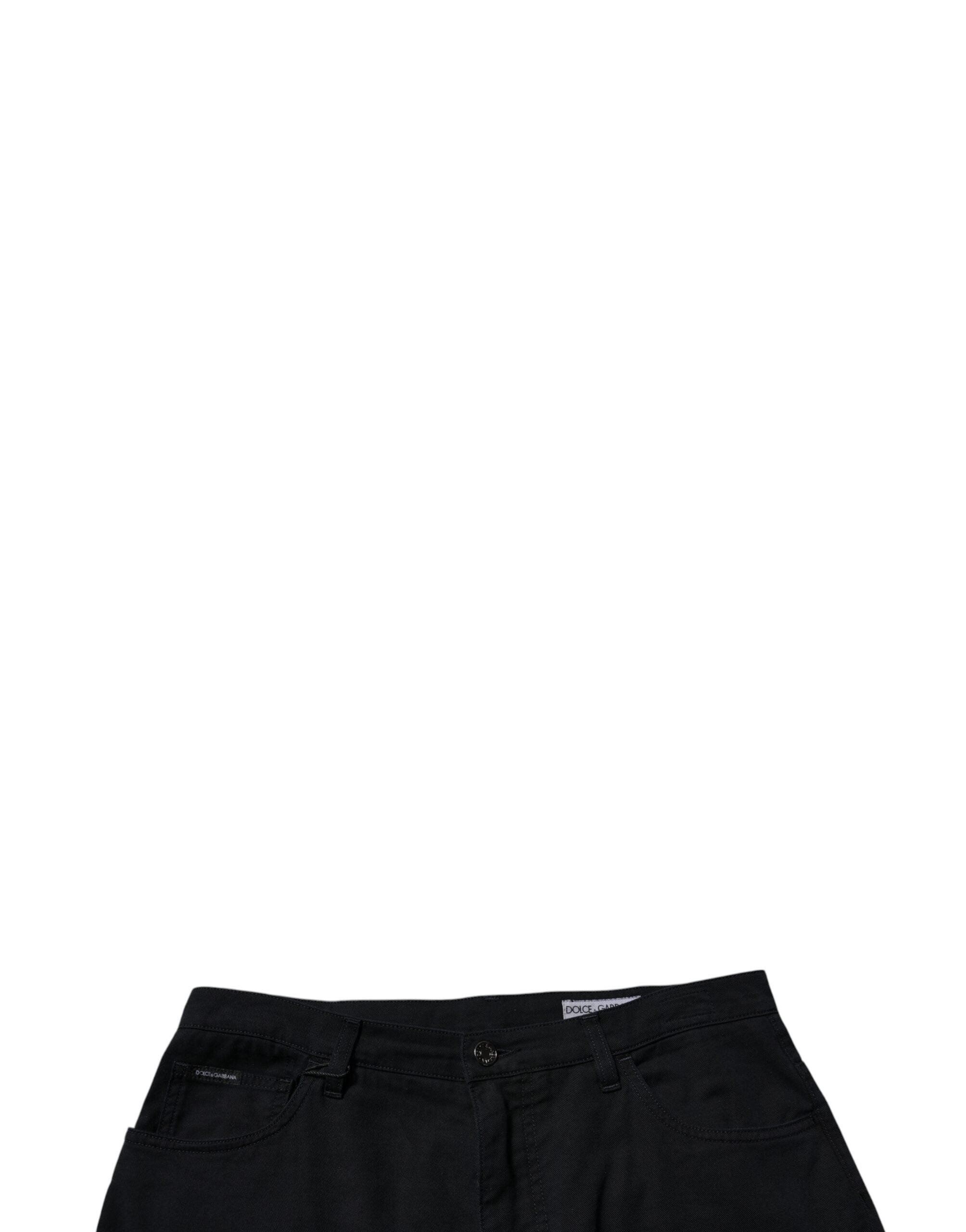 Jeans homme en denim bleu foncé Dolce & Gabbana, coton stretch, coupe ample et décontractée, détails de couture visibles.