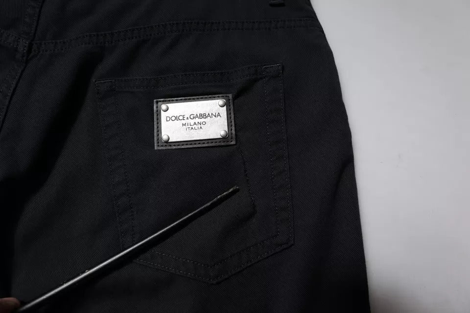 Jean homme Dolce & Gabbana en coton stretch bleu foncé, coupe ample et décontractée, avec détails en denim.