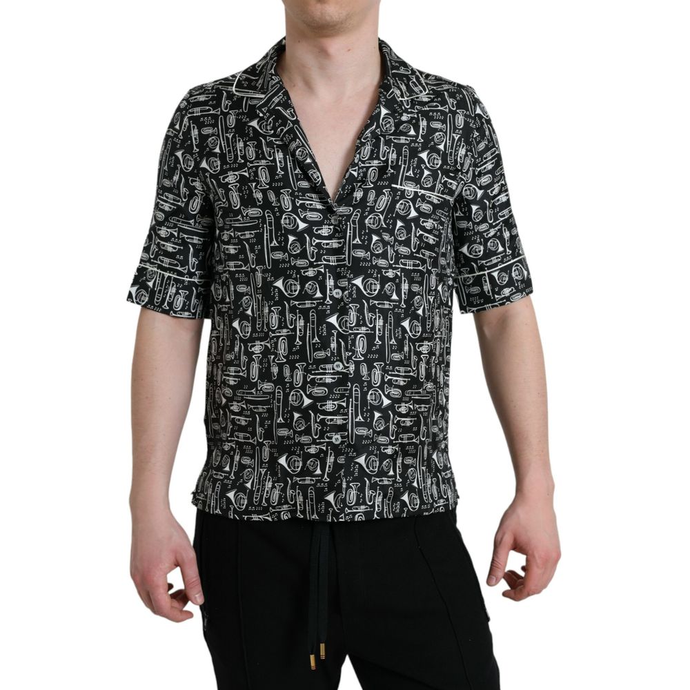 Chemise noire en soie à manches courtes de Dolce & Gabbana, tissu élégant et léger, vue de face.