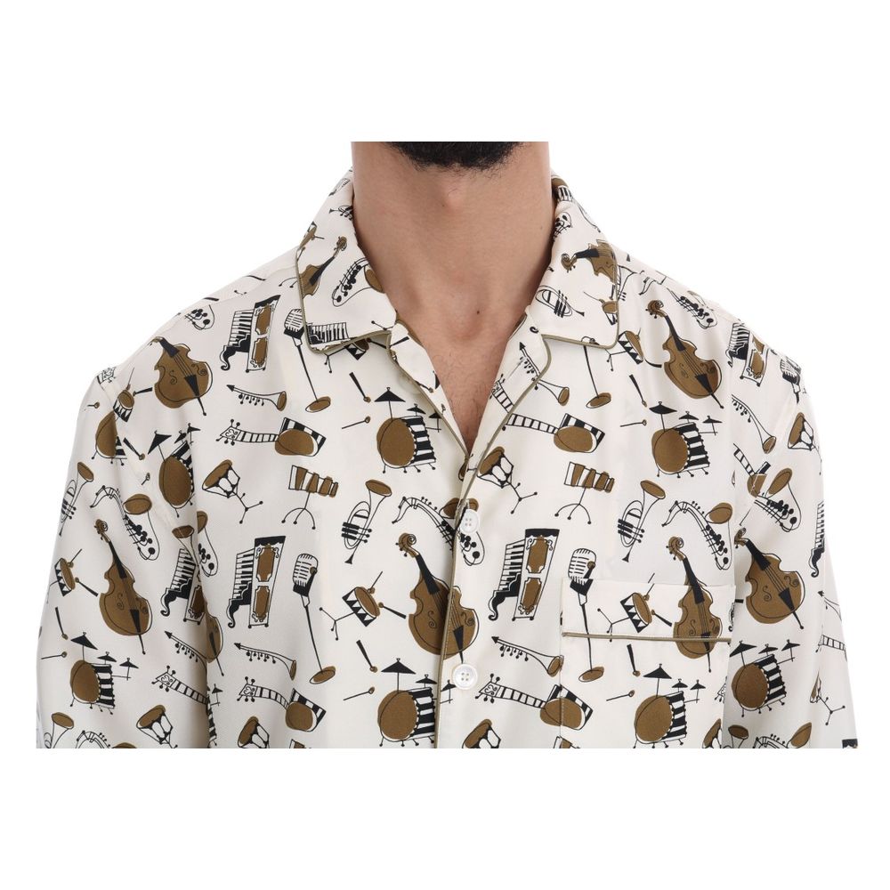 Chemise en soie multicolore Dolce & Gabbana avec motifs élégants et coupe classique, visible en gros plan.