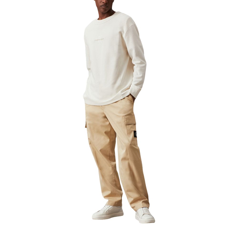 Pantalons cargo en coton beige de Calvin Klein, coupe décontractée, avec poches latérales et ceinture ajustable, pour un style confortable.