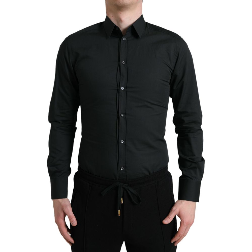 Chemise noire en coton de la marque Dolce & Gabbana, élégante et classique, visible en détail sur cette image.