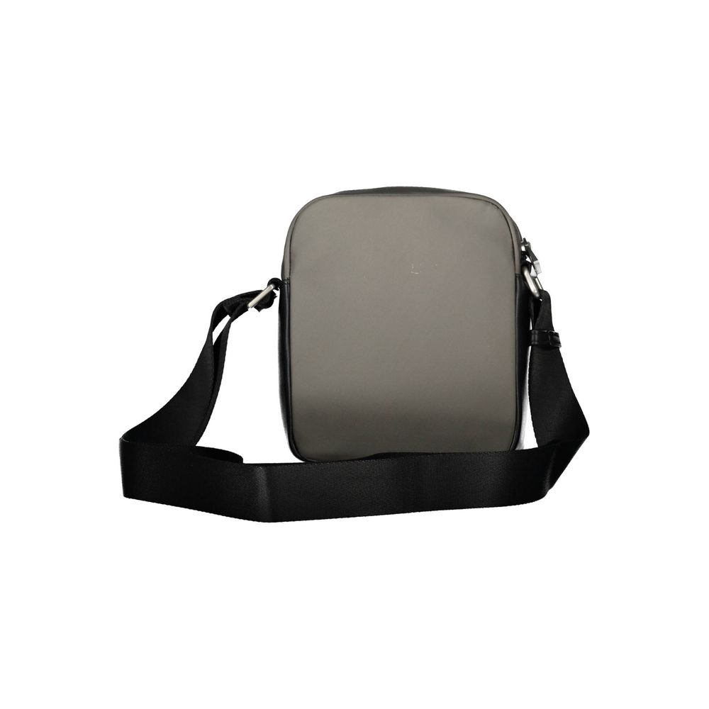 Sac à bandoulière en polyester vert Tommy Hilfiger, vue de face avec détails de la marque et design moderne.