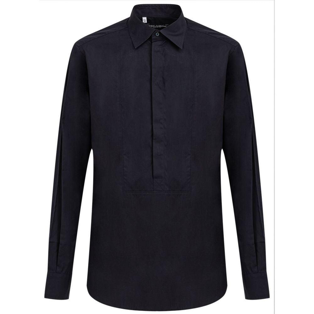 Chemise en coton bleu marine Dolce & Gabbana, style élégant, boutonnière visible, tissu doux et de haute qualité.