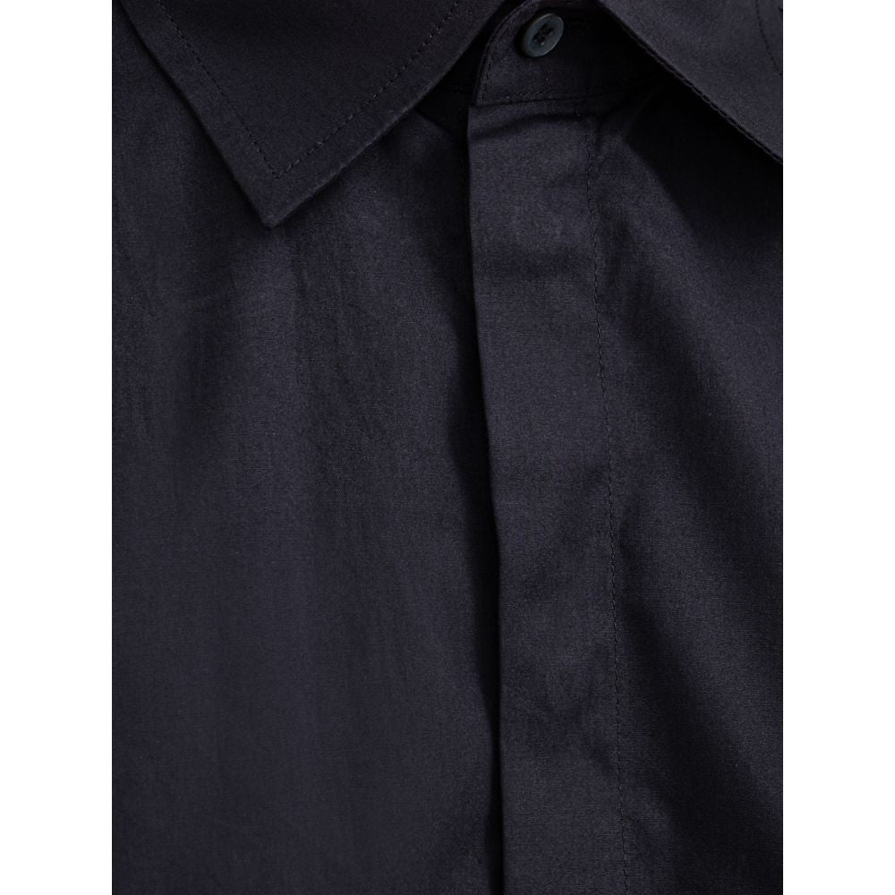 Chemise en coton bleu marine Dolce & Gabbana, élégante et classique, avec col et boutons visibles.
