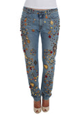 Jeans Dolce & Gabbana avec motifs en cristaux et roses en embellissements, style élégant et floral.
