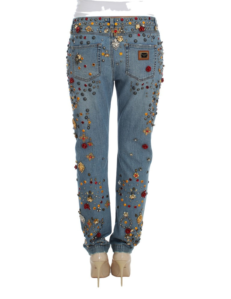 Jeans Dolce & Gabbana avec embellissements de roses en cristal et motif en forme de cœur, mode élégante et raffinée.