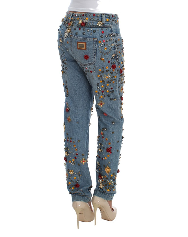 Jeans Dolce & Gabbana avec embellissements de roses en cristal et motif cœur, mode élégante et détaillée.