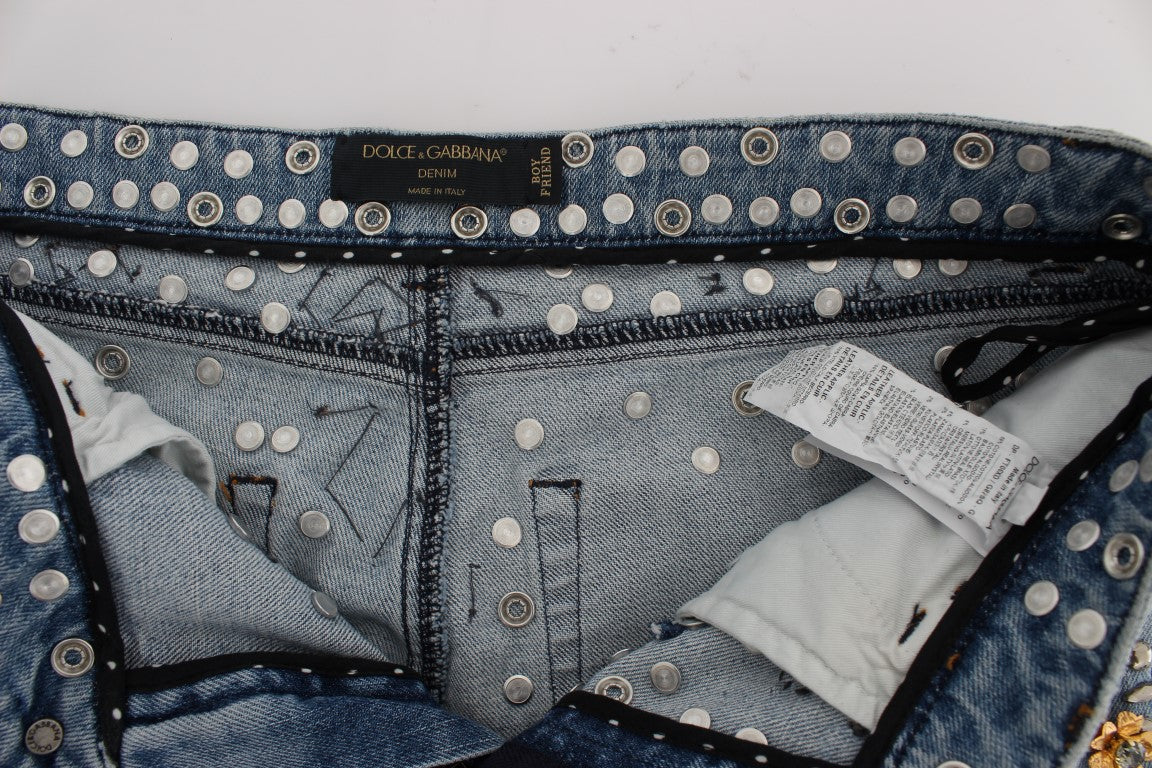 Jeans Dolce & Gabbana avec embellissements en cristaux de roses en forme de cœur, mode élégante et raffinée.