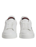 Chaussures sneakers Portofino blanches et rouges Dolce & Gabbana avec logo visible, en toile légère et design élégant.