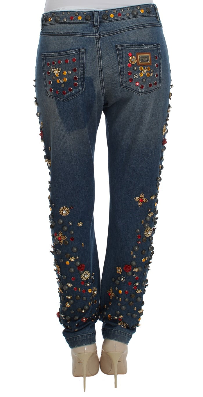 Jeans Dolce & Gabbana avec embellissements en cristaux de roses en forme de cœur, détails élégants et mode sophistiquée.
