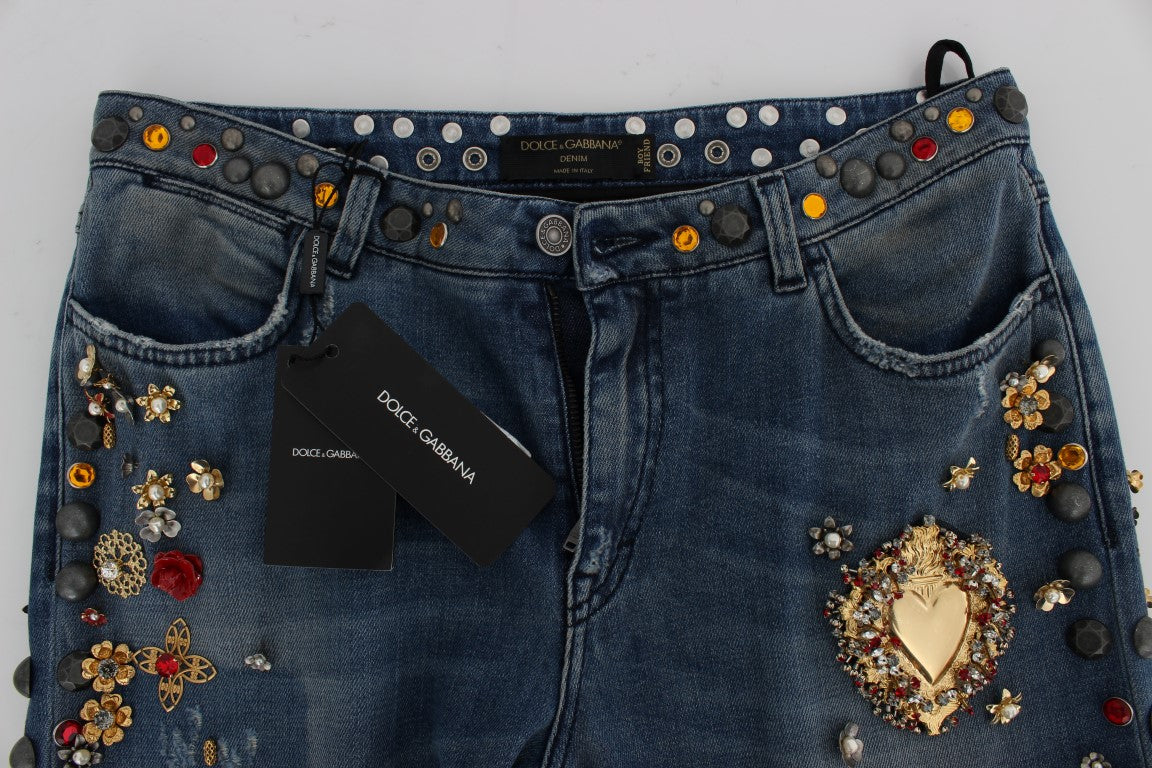 Jeans Dolce & Gabbana avec décor en cristaux de roses en forme de cœur, style élégant et orné.