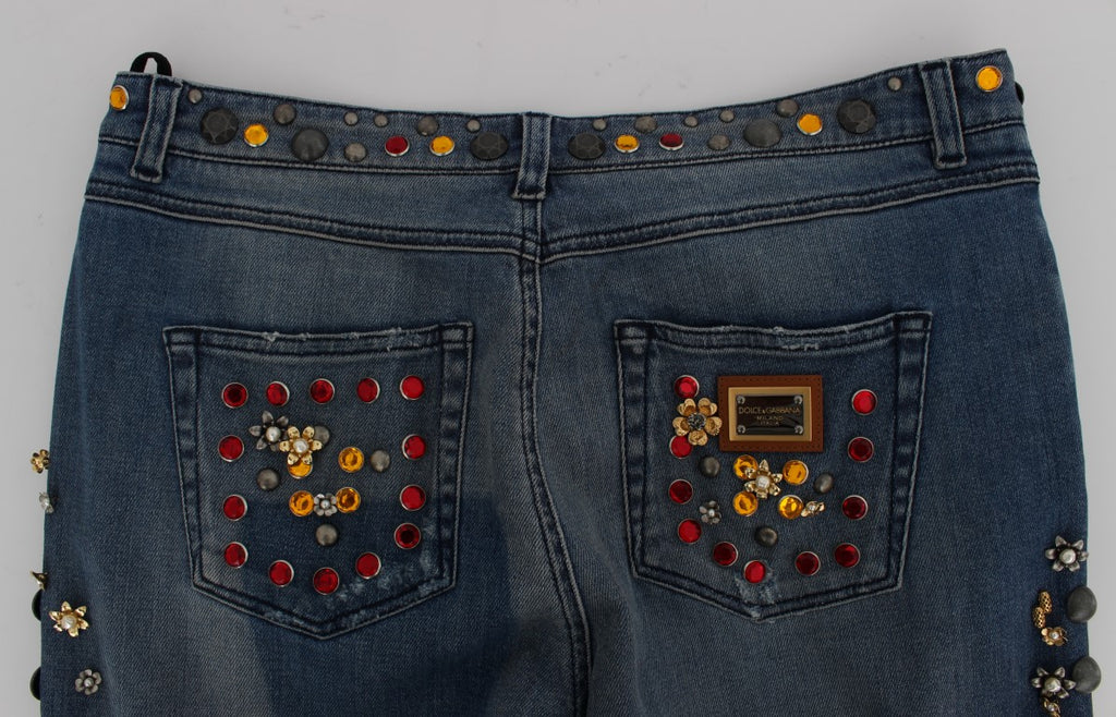 Jeans Dolce & Gabbana avec embellissements en cristaux en forme de roses et cœur, détails élégants et mode raffinée.