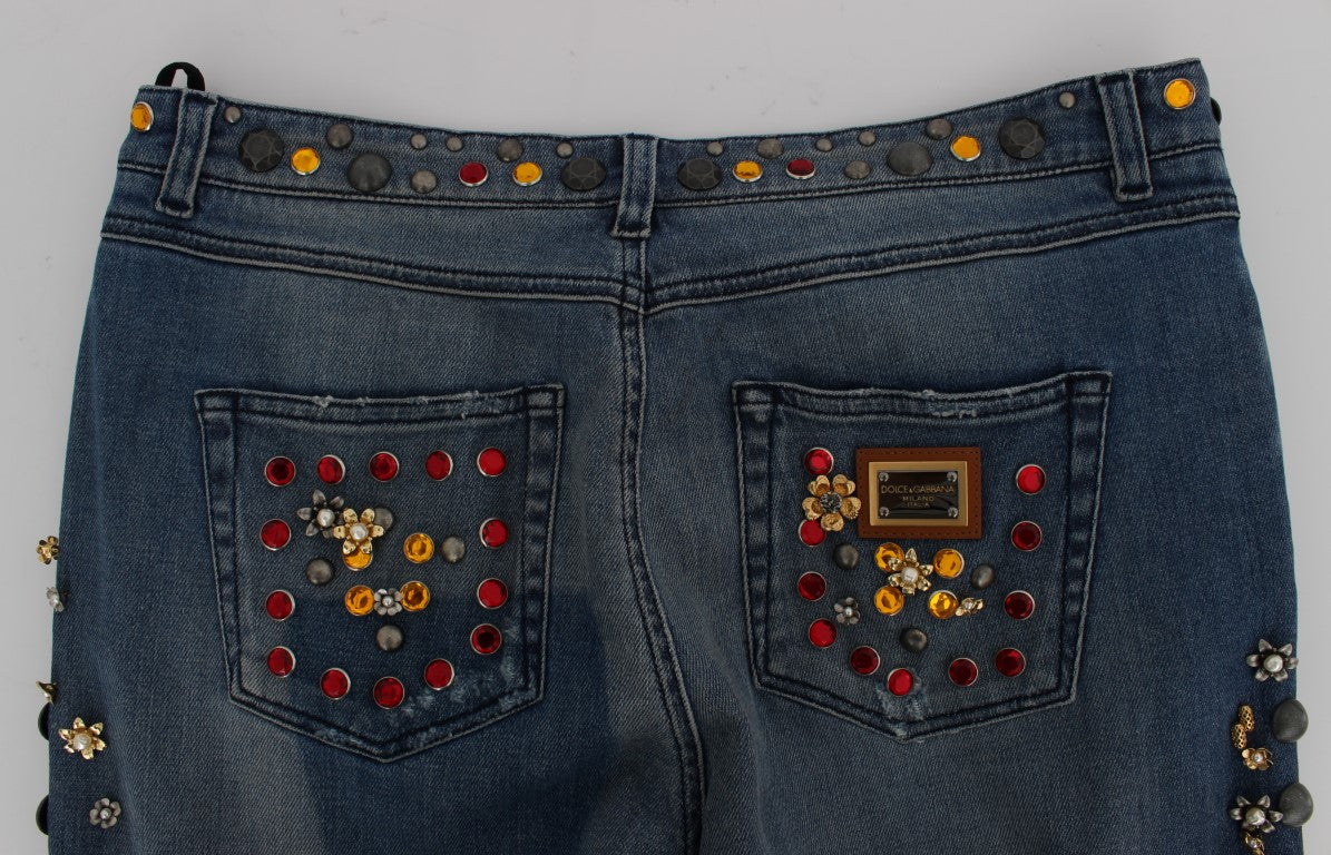 Jeans Dolce & Gabbana avec embellissements en cristaux en forme de roses et cœur, détails élégants et mode raffinée.