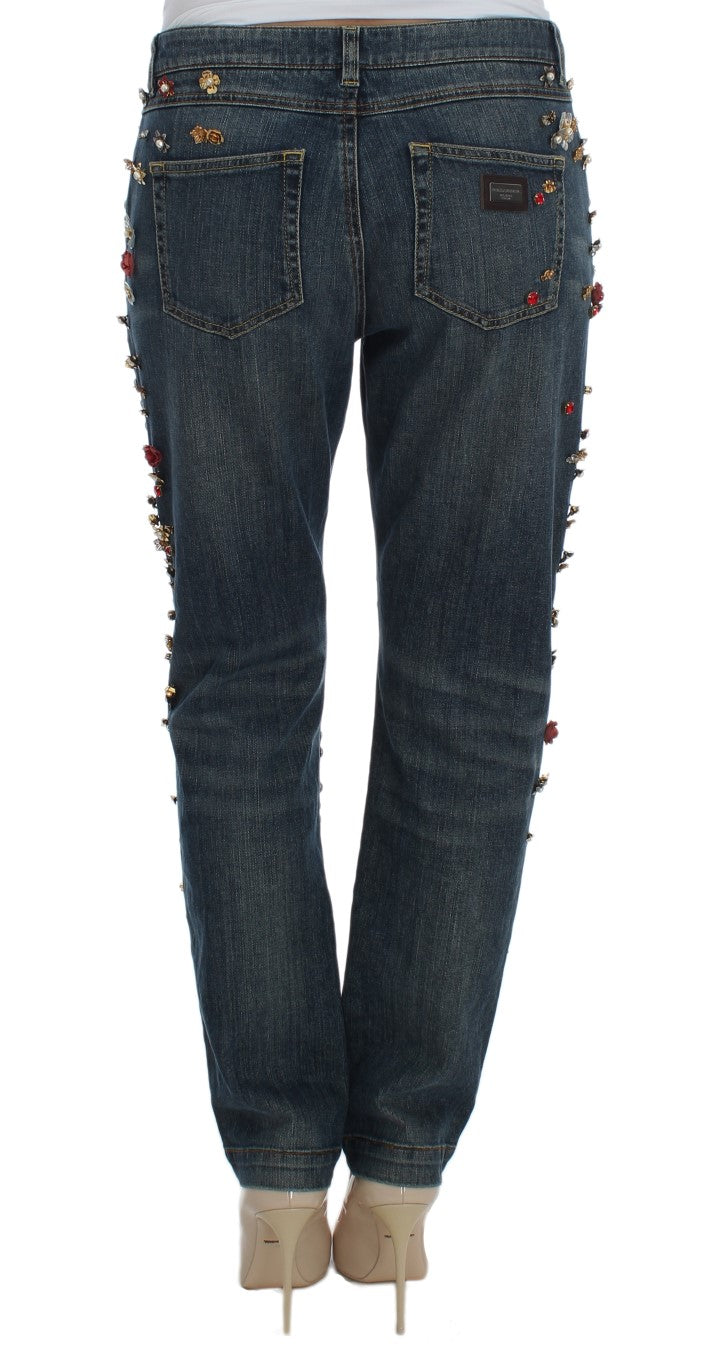 Jeans Dolce & Gabbana avec embellissements de roses en cristal et motif cœur, détails élégants et sophistiqués.