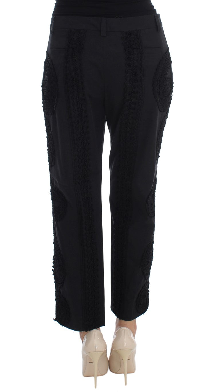 Pantalons capri noirs en coton stretch Dolce & Gabbana avec détails de style torero, image montrant la coupe et la texture du tissu.