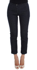 Jean capri slim à pois Dolce & Gabbana, coupe ajustée et élégante, en denim avec motif à pois noirs et blancs.