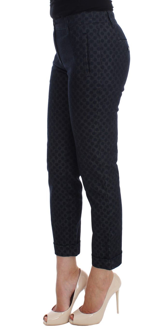 Jean capri slim à pois Dolce & Gabbana, coupe ajustée, denim bleu avec motifs à pois noirs, mode élégante et tendance.