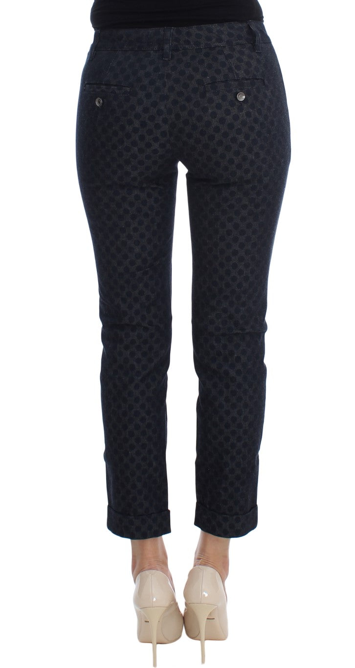 Jeans capris slim à pois Dolce & Gabbana, pantalon taille moyenne avec motif à pois noir et blanc, coupe ajustée et moderne.
