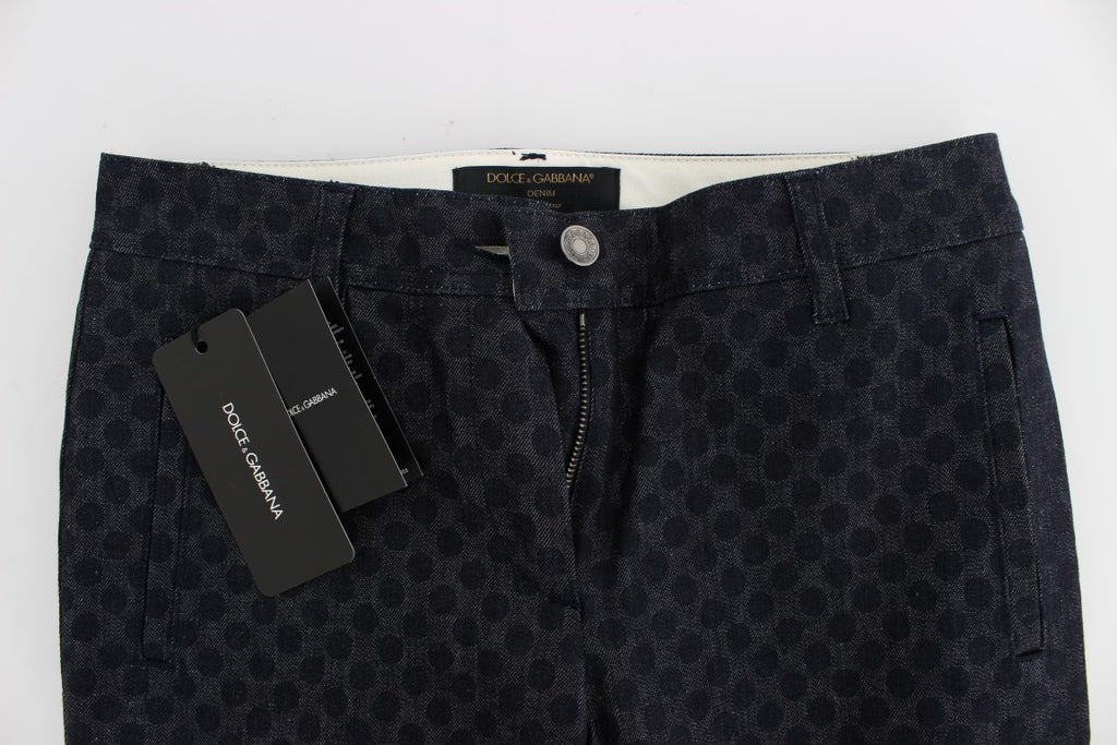 Jeans capri slim à pois Dolce & Gabbana, coupe ajustée, denim bleu avec motifs à pois noirs, pour un style élégant et tendance.