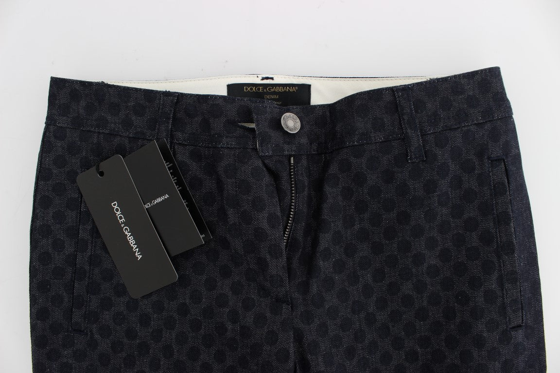 Jeans capri slim à pois Dolce & Gabbana, coupe ajustée, denim bleu avec motifs à pois noirs, pour un style élégant et tendance.