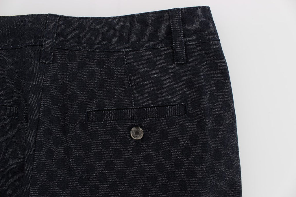 Jeans capri slim à pois Dolce & Gabbana, denim bleu avec motifs à pois noirs, style moderne et élégant.