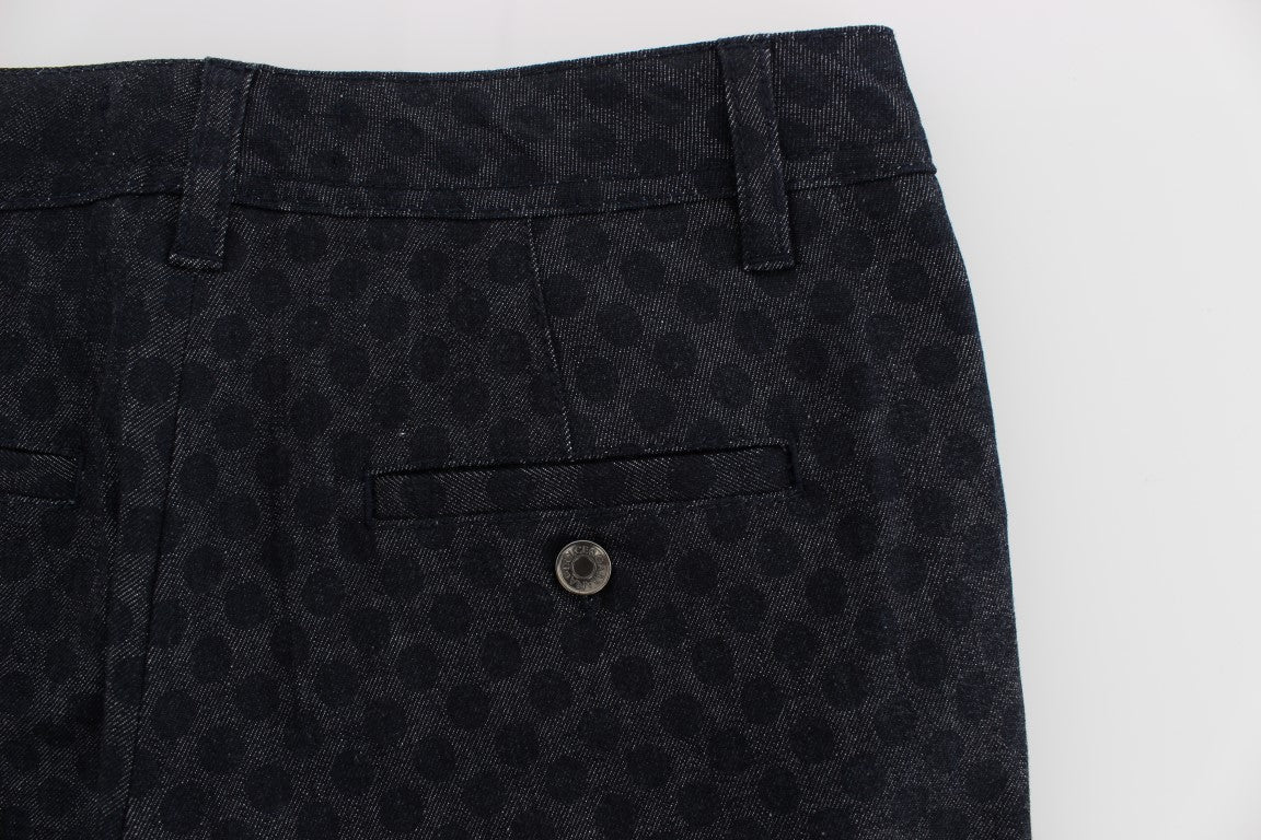 Jeans capri slim à pois Dolce & Gabbana, denim bleu avec motifs à pois noirs, style moderne et élégant.