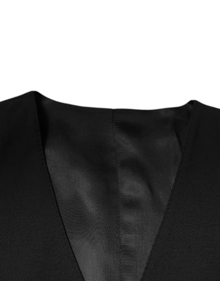 Gilet homme en laine noire Dolce & Gabbana, costume formel élégant, détail de la veste de costume noire.
