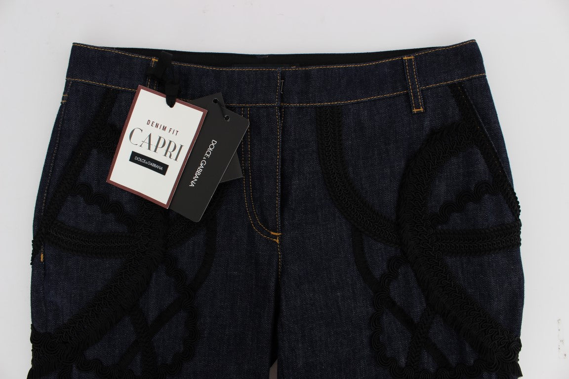 Jeans Capri en denim bleu en coton Dolce & Gabbana avec détails de style torero, vue de face.
