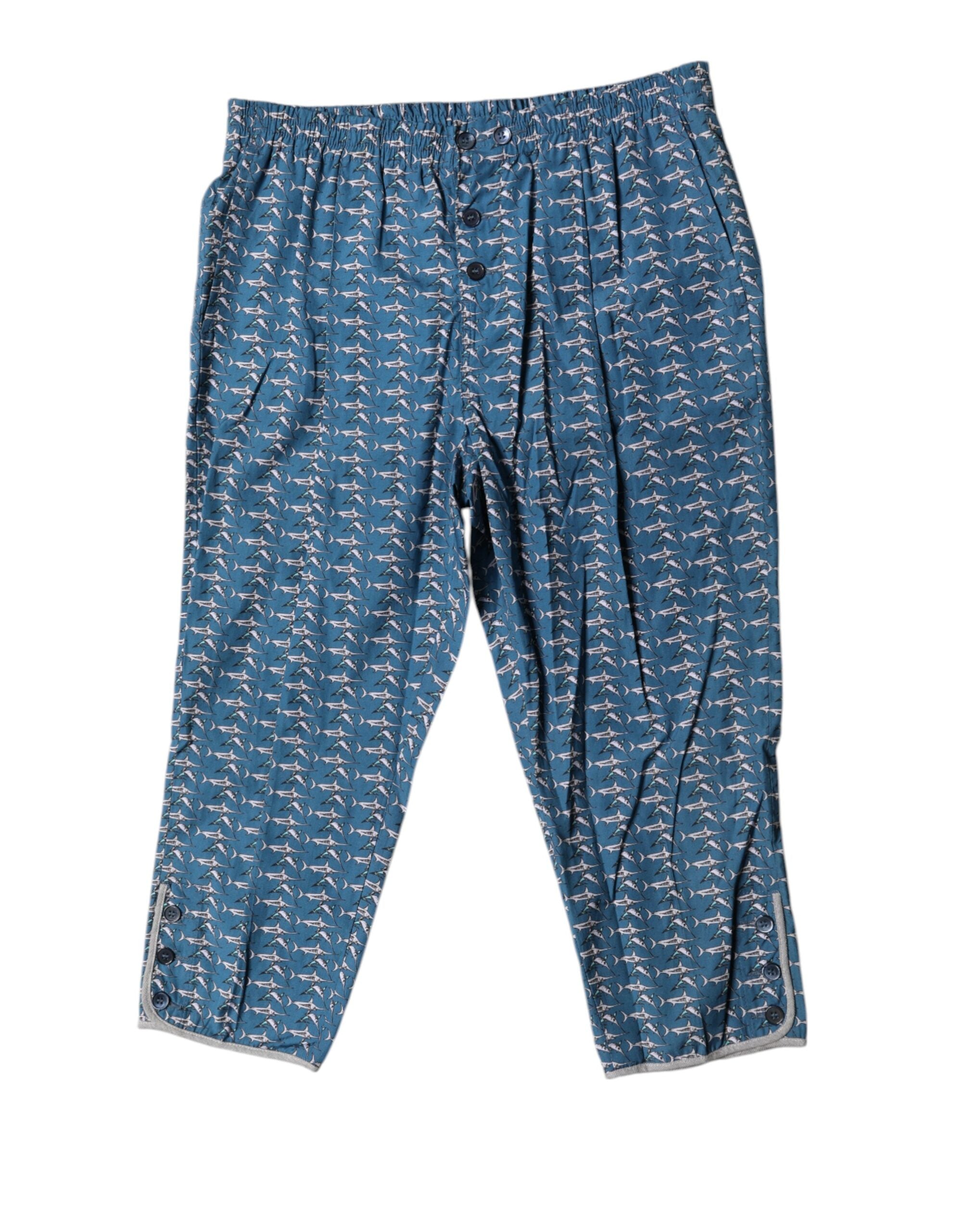 Maillot de bain court Dolce & Gabbana avec imprimé requin bleu, style plage et mode estivale.