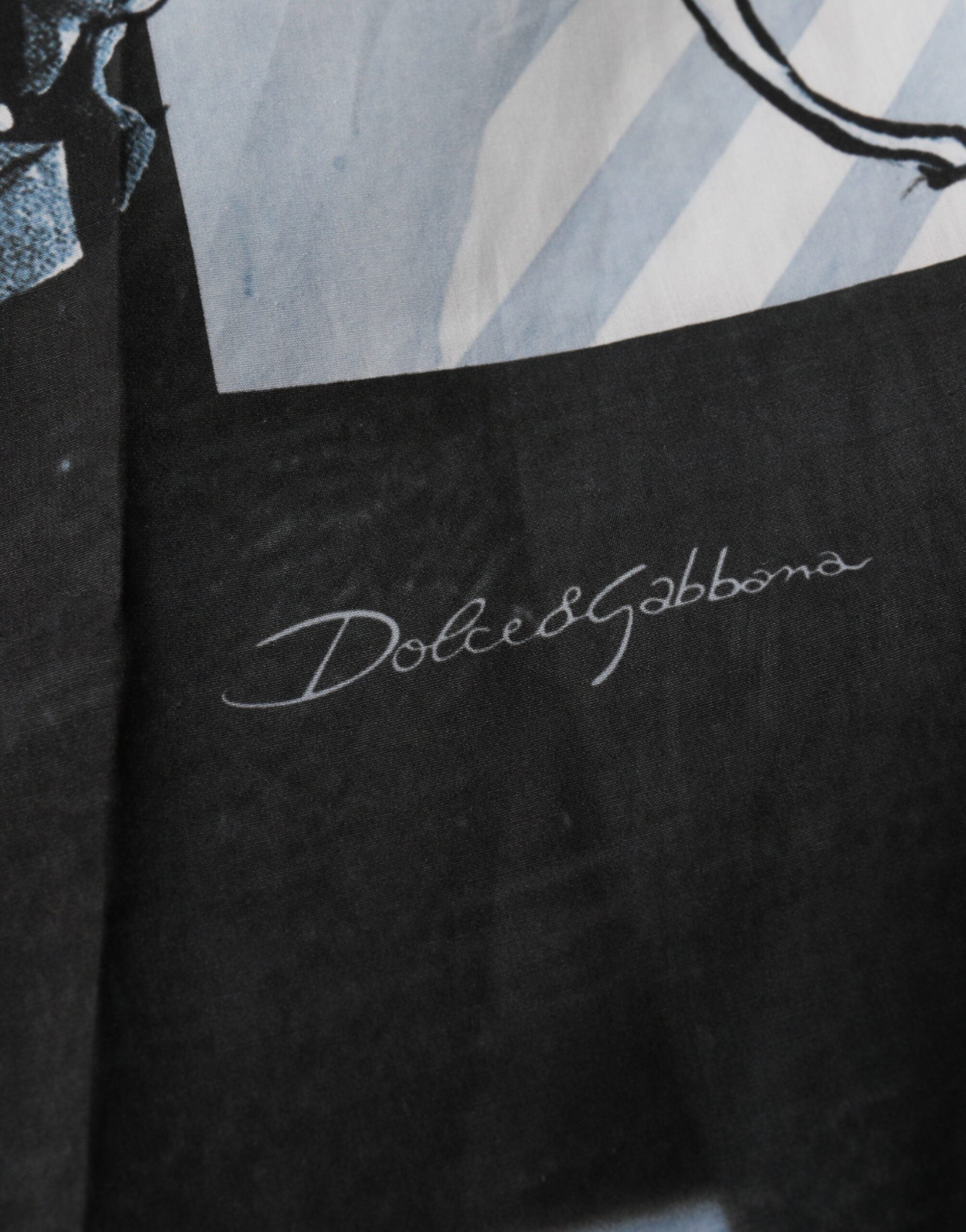 Shorts homme en coton Dolce & Gabbana avec imprimé statue bleue, style décontracté et tendance.