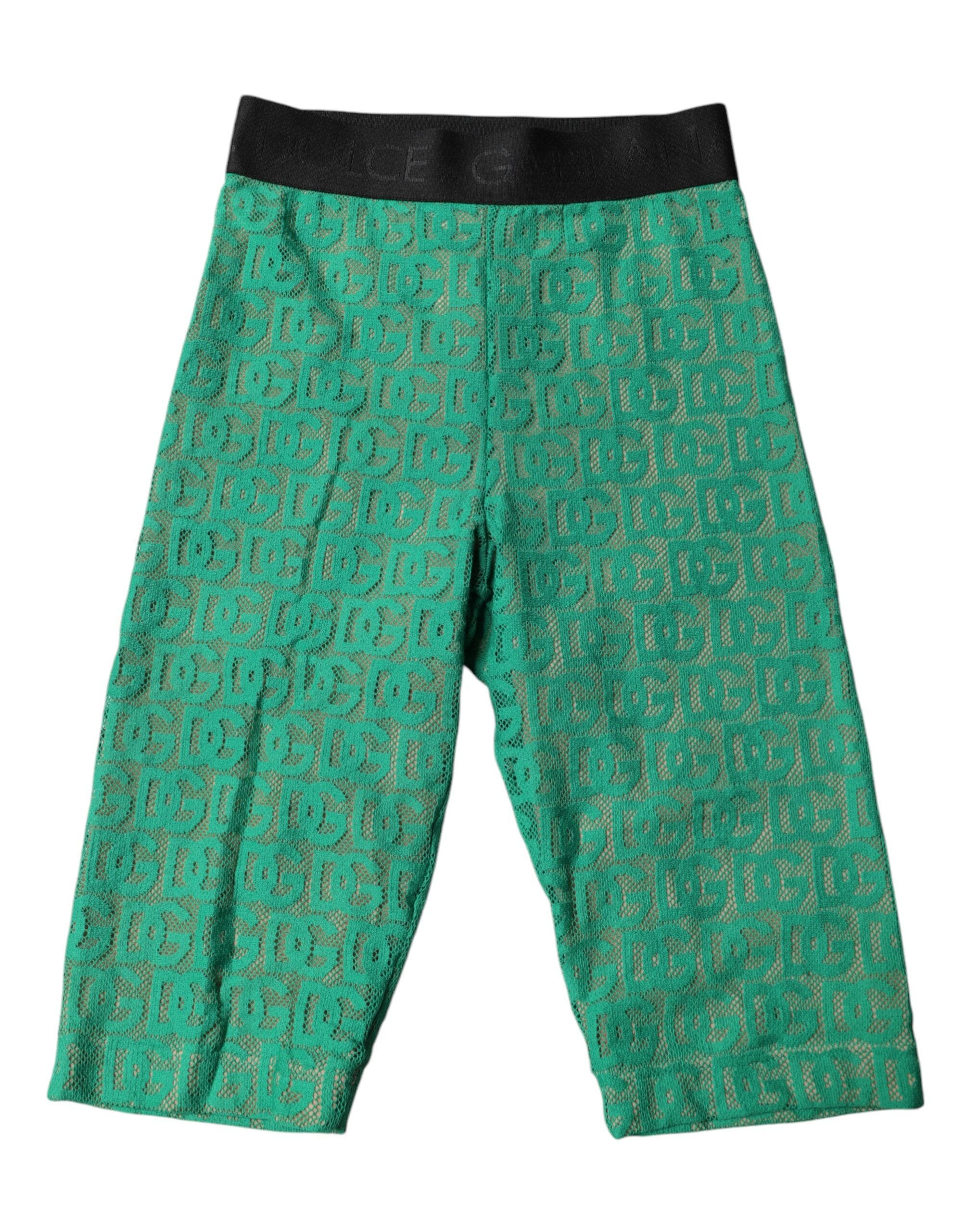 Collants courts verts Dolce & Gabbana avec logo monogramme, design élégant et ajusté, visibles sur la photo.