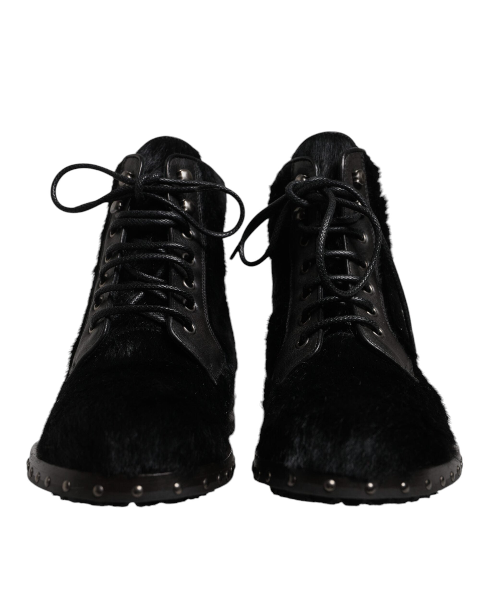 Bottes mi-mollet en cuir noir style pony de Dolce & Gabbana, chaussures élégantes avec finition sophistiquée.