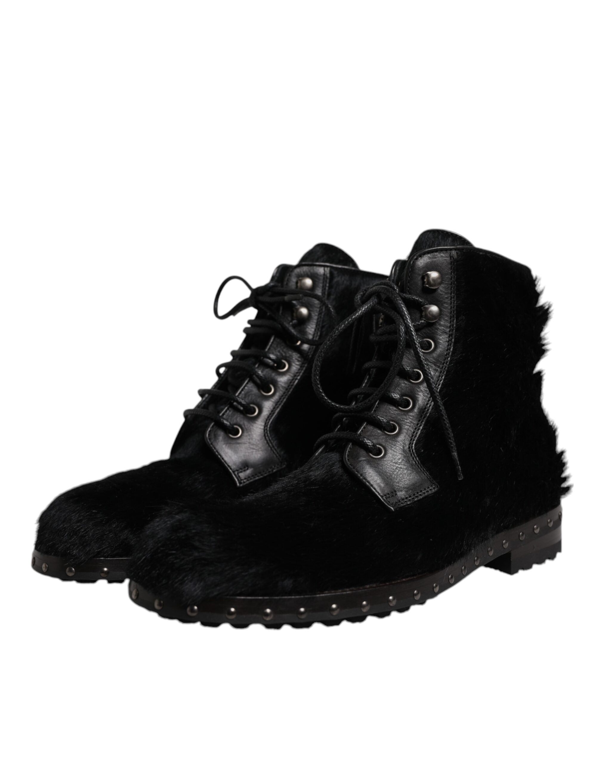 Bottes mi-mollet en cuir noir style poney de Dolce & Gabbana, chaussures élégantes pour femme.
