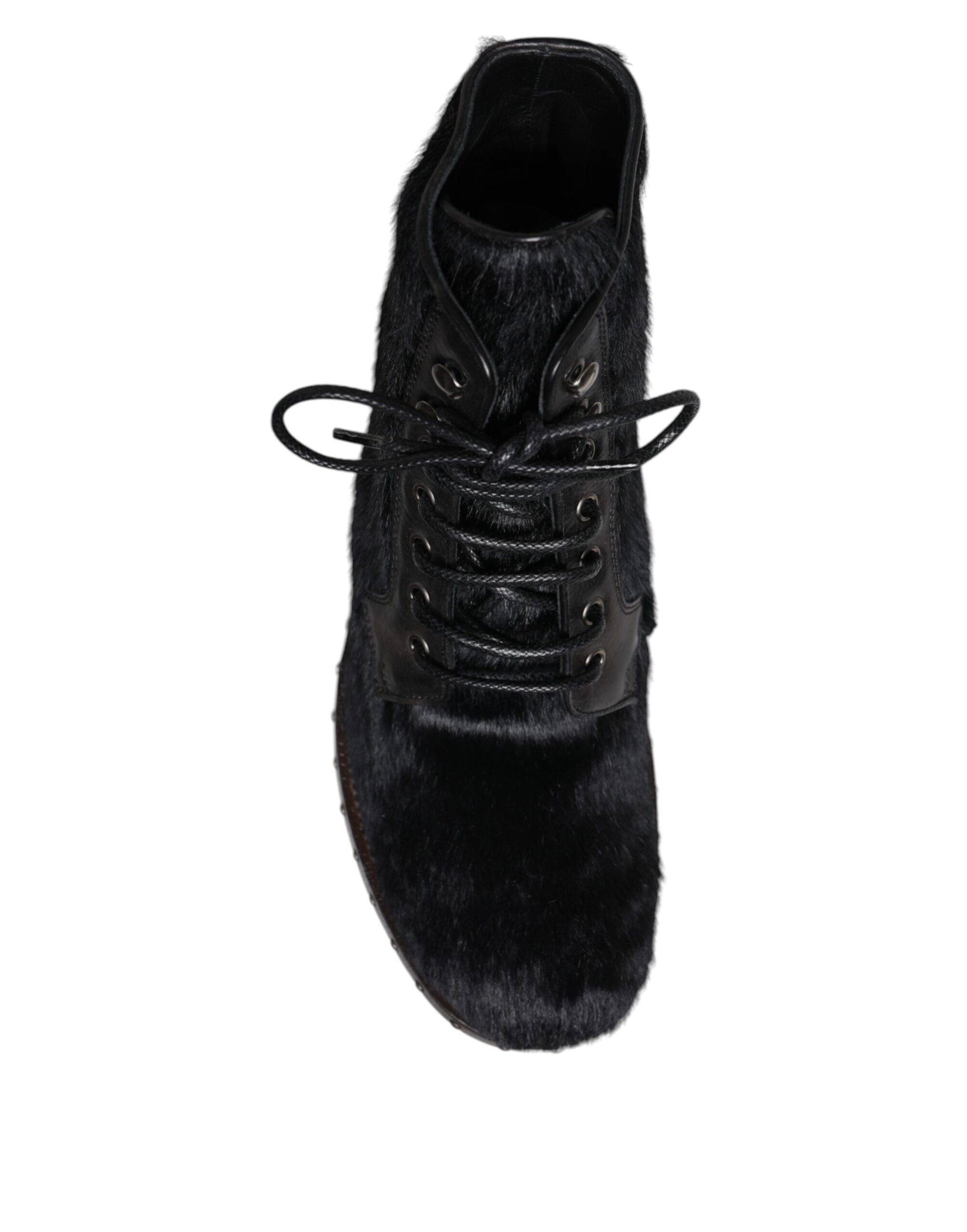 Bottes en cuir noir pony style mi-mollet de Dolce & Gabbana, chaussures élégantes et tendance.